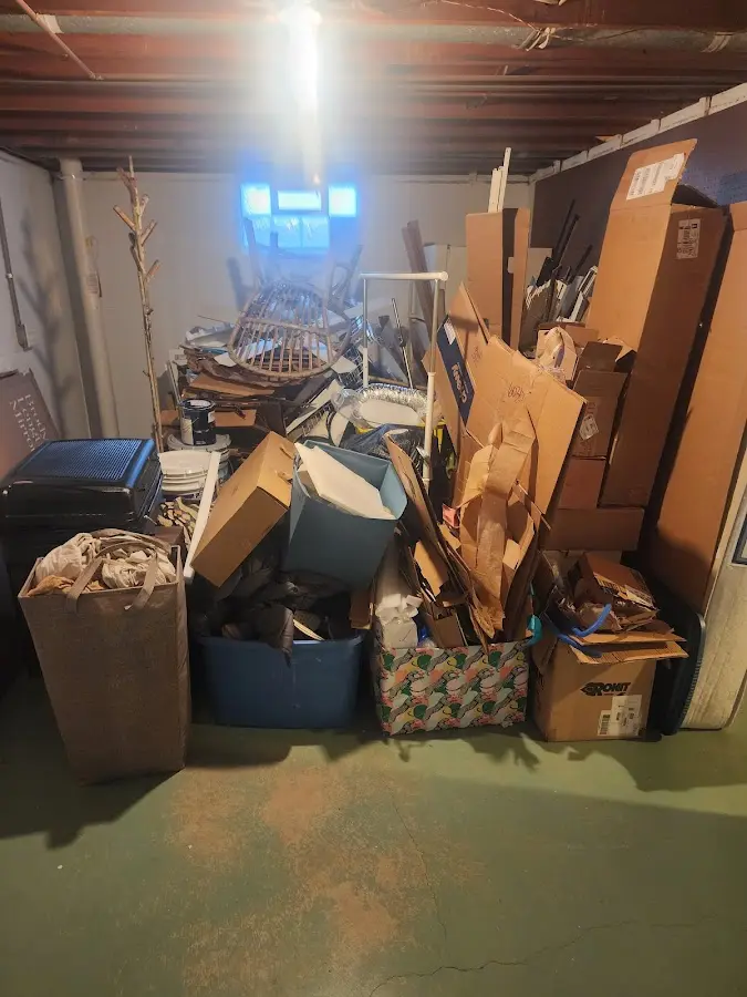 Roll-off dumpster container at job site for 2 Yard Dumpster Rental in Manassas